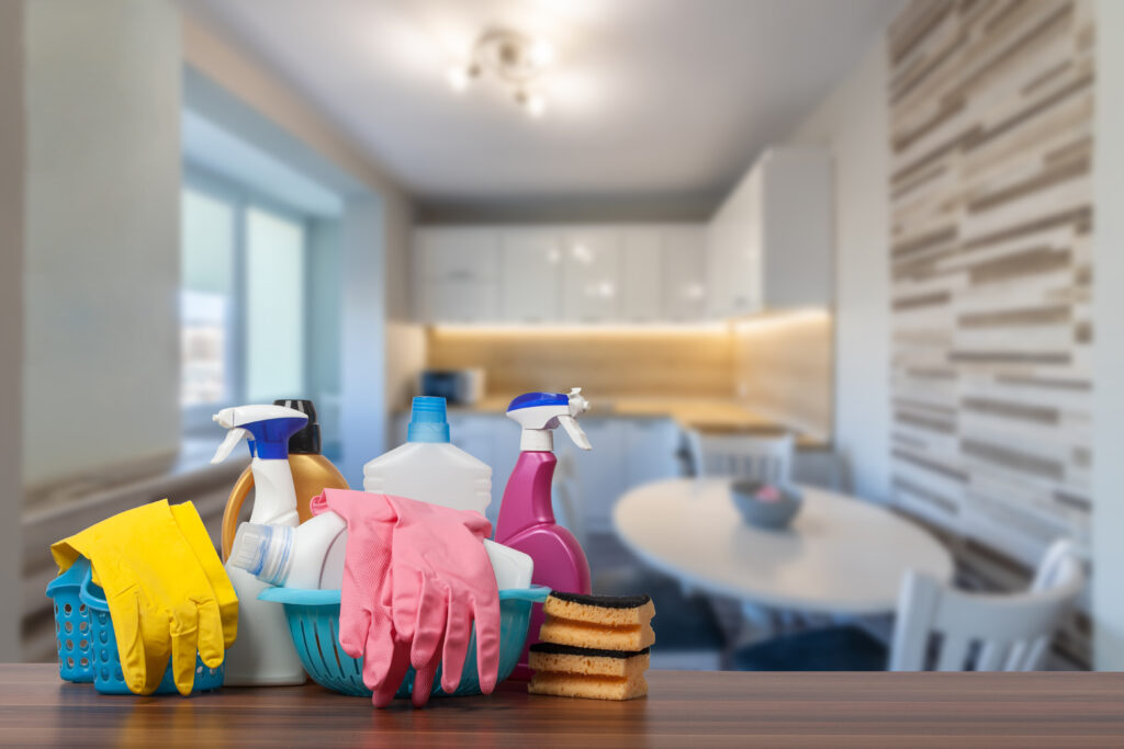 Home cleaning service concept with supplies. Close up of cleanin